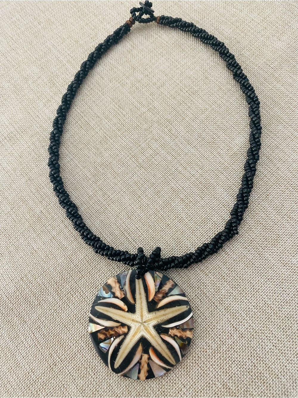 Black Beaded Necklace with Starfish Pendant
